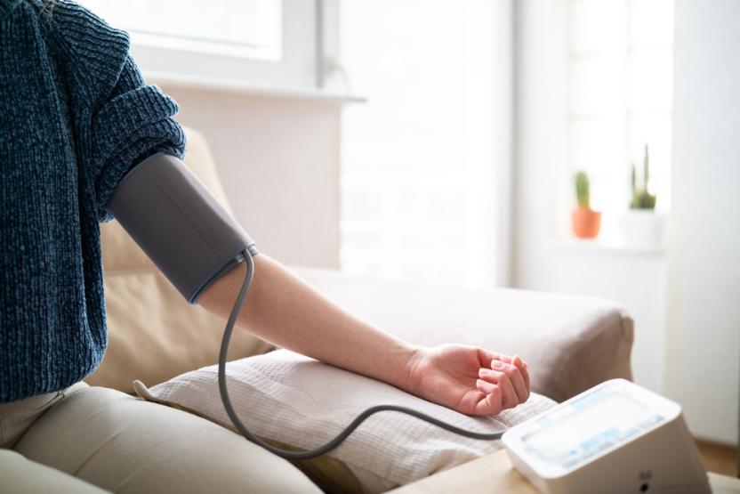 Someone getting their blood pressure taken